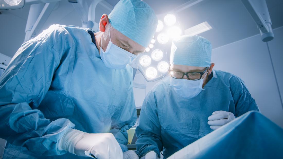 surgeons performing modified radical mastectomy
