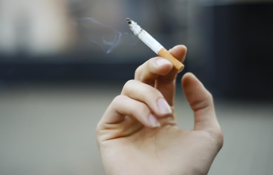 woman smoking a cigarette