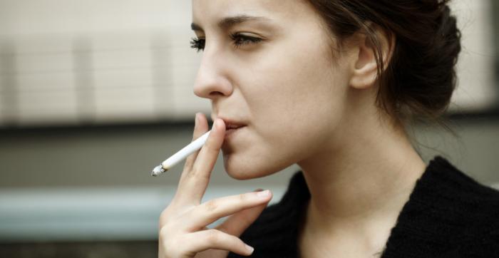A young woman smoking