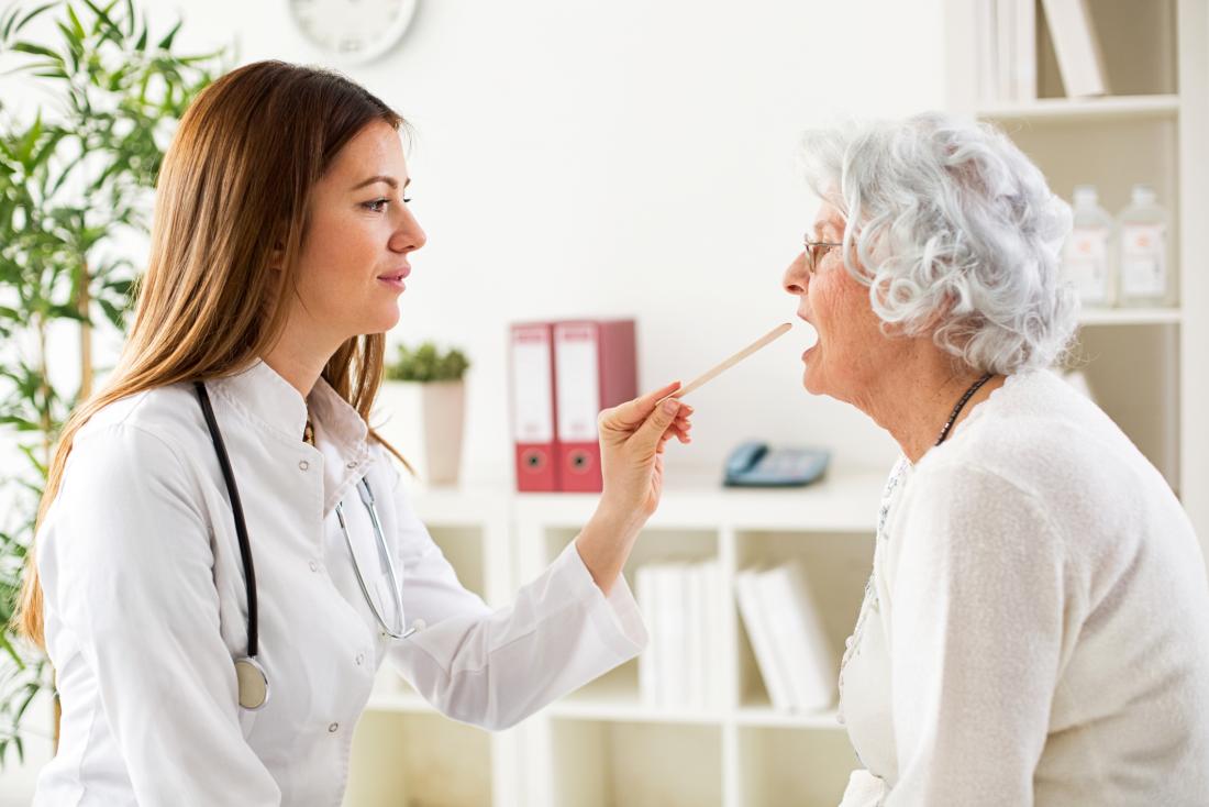 A doctor will examine the person's throat