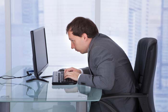 Example of poor posture when using a computer