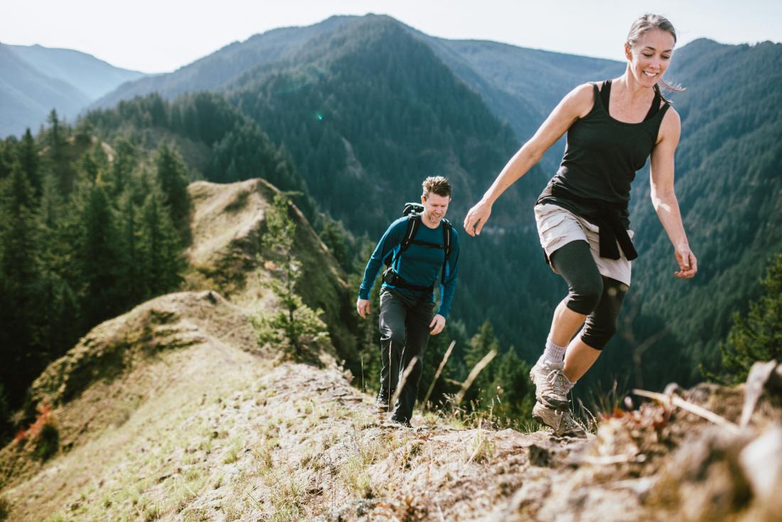 Couple climb mountain