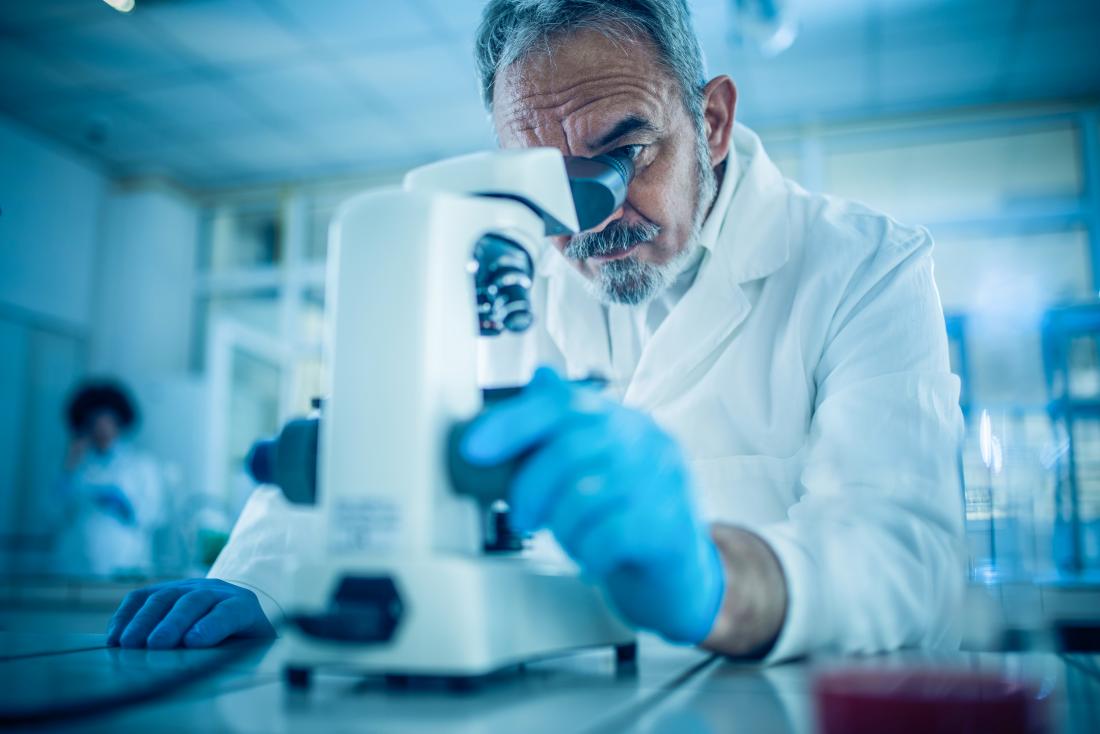 Man with microscope