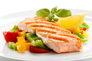 Salmon together with salad