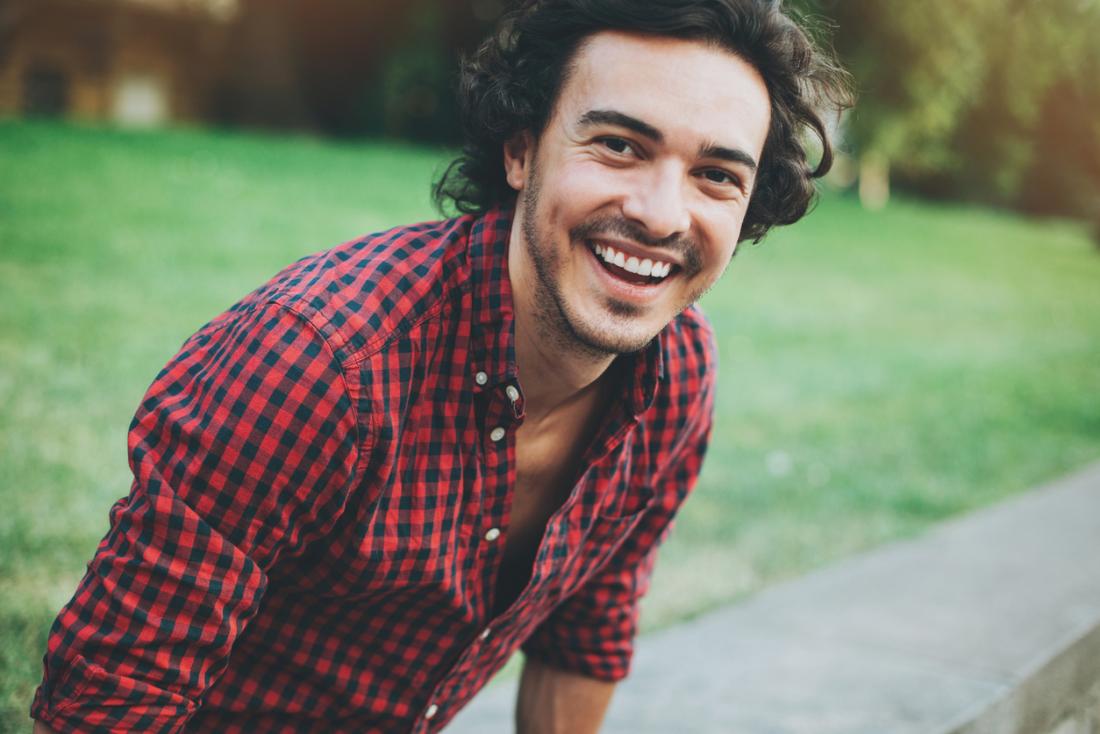 Happy checkered shirt man