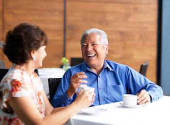 2 people drinking tea together