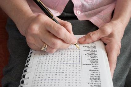Lady completing a puzzle