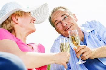 Couple toasting each other with champagne