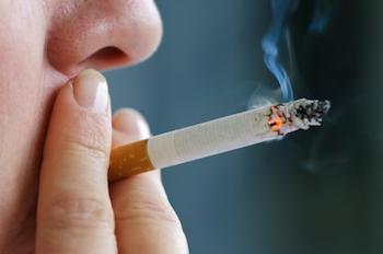 Male smoking a cigarette