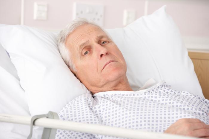 depressed patient in hospital bed