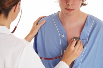 Doctor checking patient with stethascope