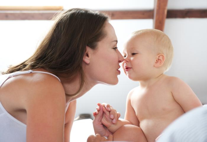 mother and baby playing
