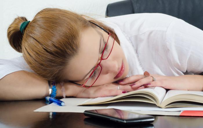 Kid asleep on desk