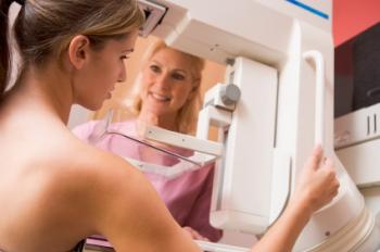 A woman having a mammogram