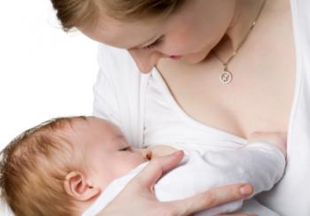 A mother breastfeeding her baby