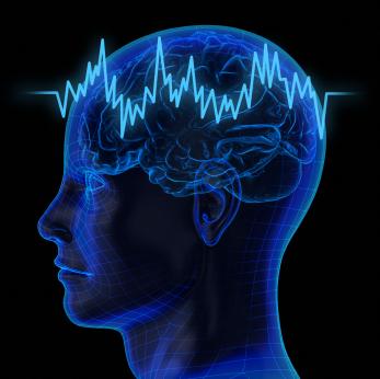 Image of the brain with electrical pulse.
