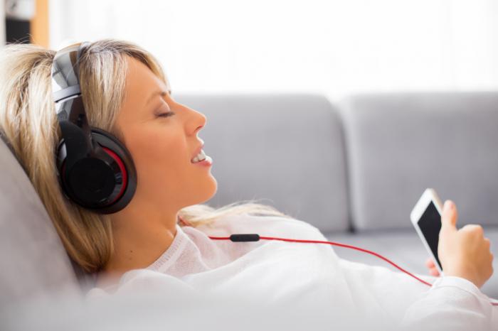 A woman listening to music