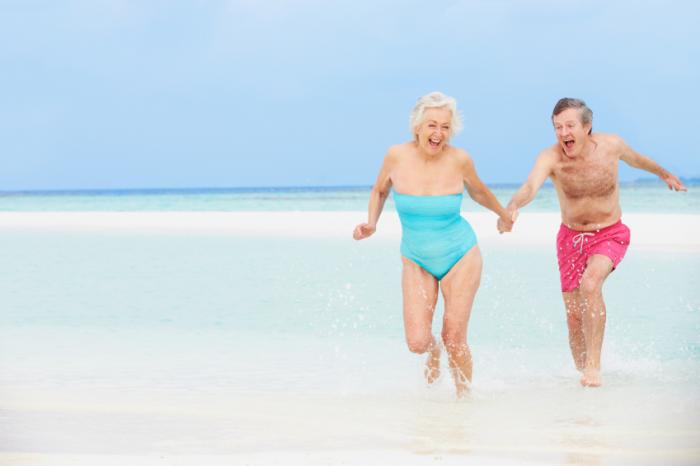 Seniors having fun on beach