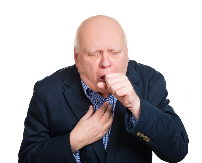 older man coughing