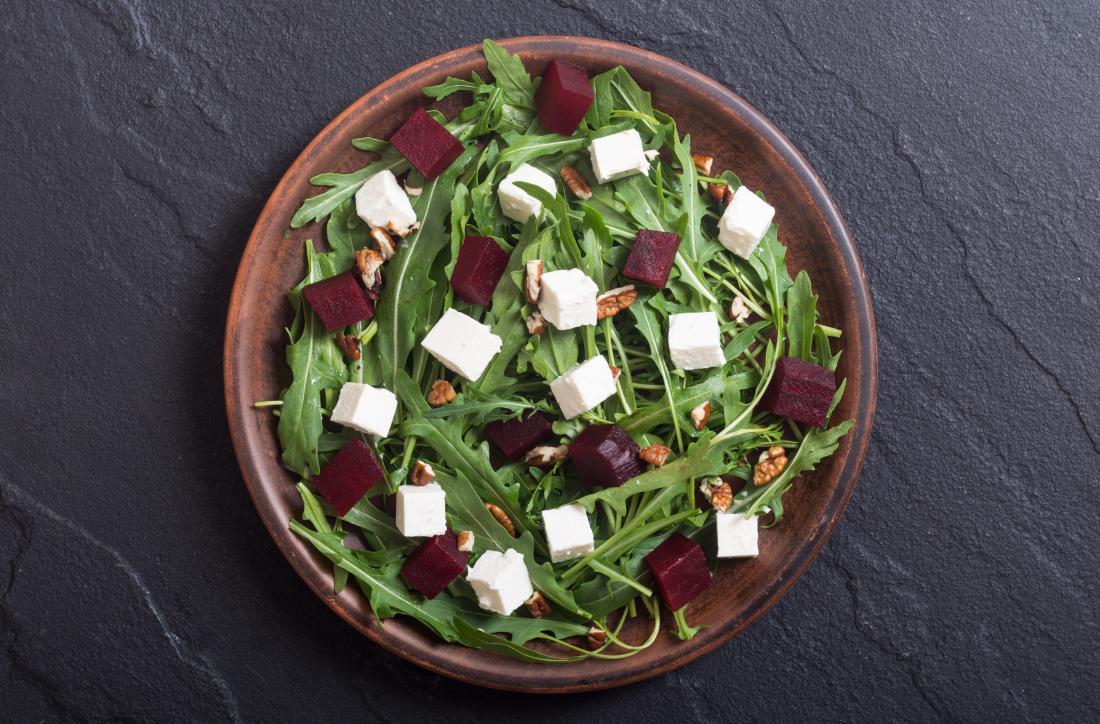 Sprinkle walnuts on a salad