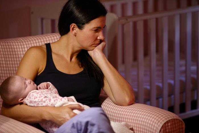 A mother with postpartum depression.