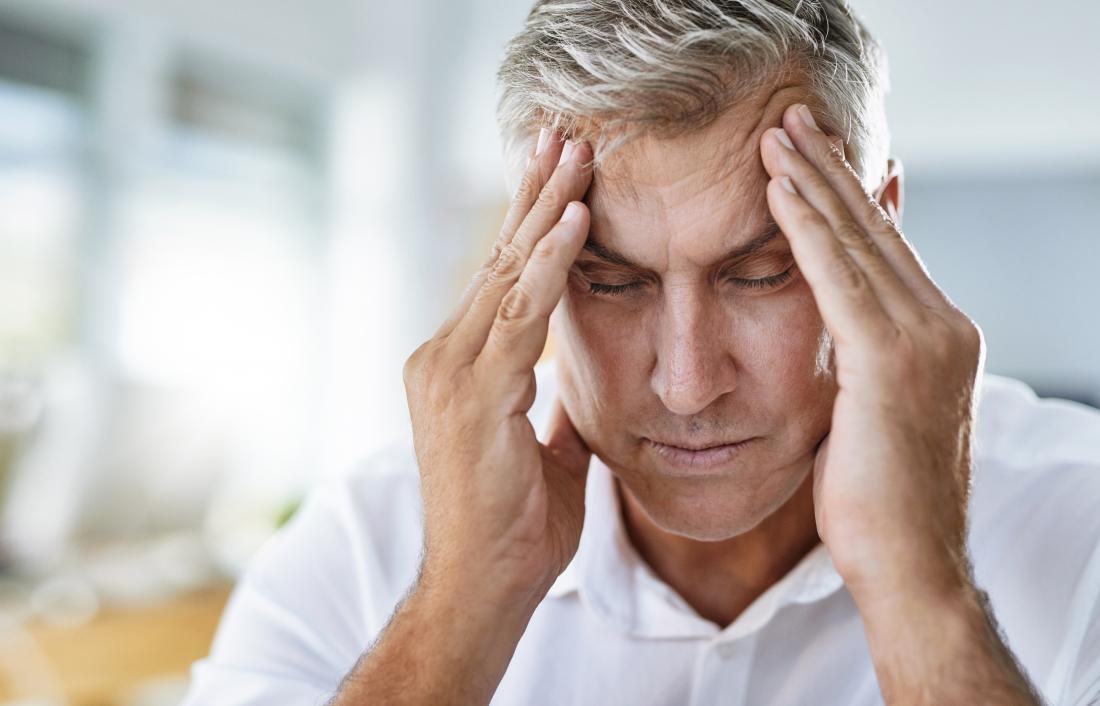 man with hypertension headache