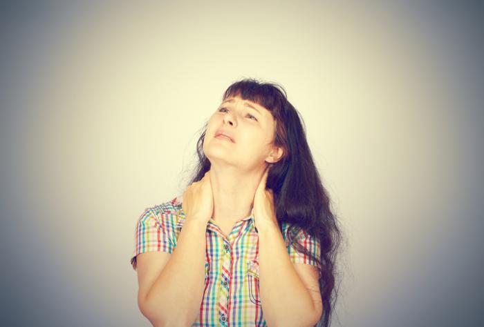 Woman has pain in her neck