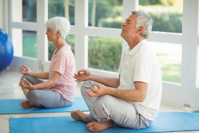 Older people doing meditation
