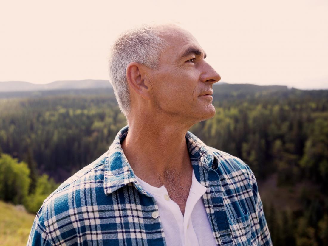 a man looks pensive as he thinks about metastatic lung cancer