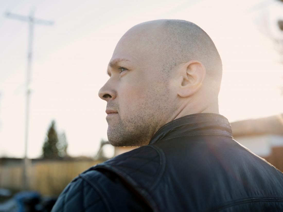 a man looking pensive about his stage 3 lung cancer diagnosis