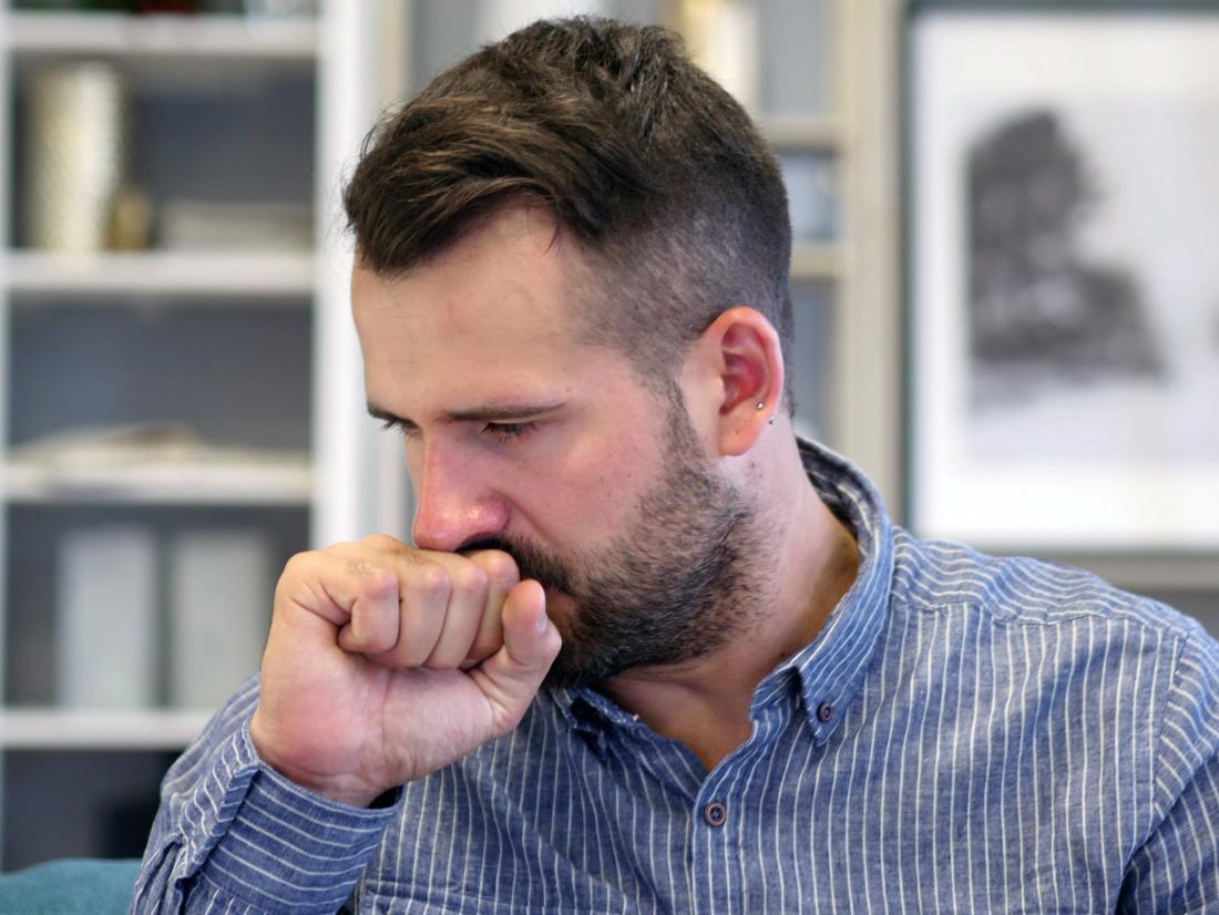 a man with a cough because of small cell lung cancer