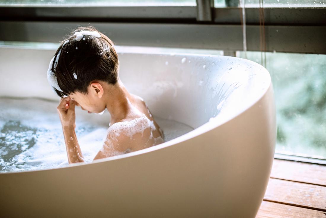 child in bath