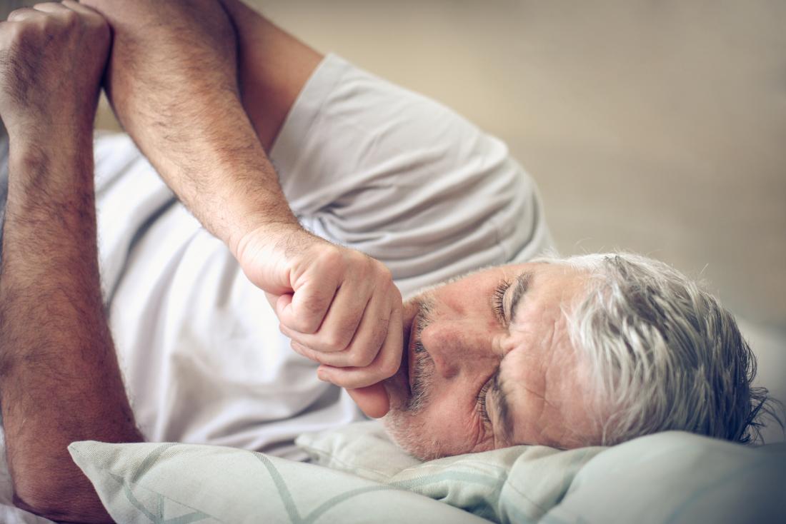 man coughing