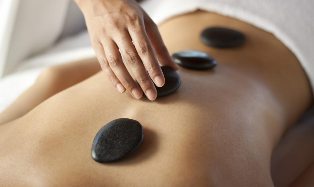 Hot stone massage therapy 5 benefits