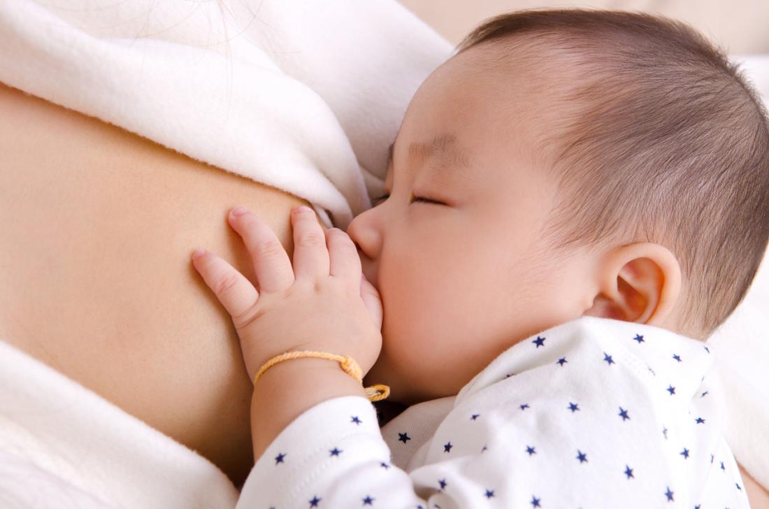 mother feeding baby