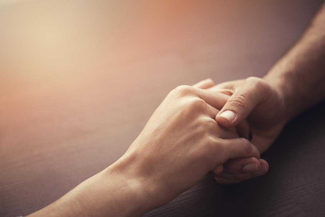 A partner's touch relieves pain, study shows