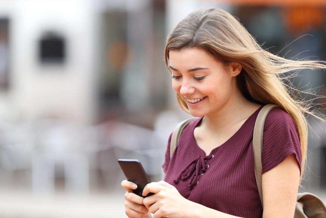 woman checking her smartphone