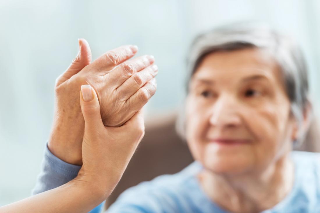 physical therapy on an older ladies hand