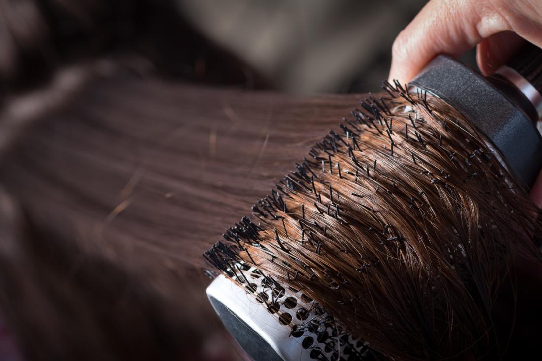 Hair being brushed.