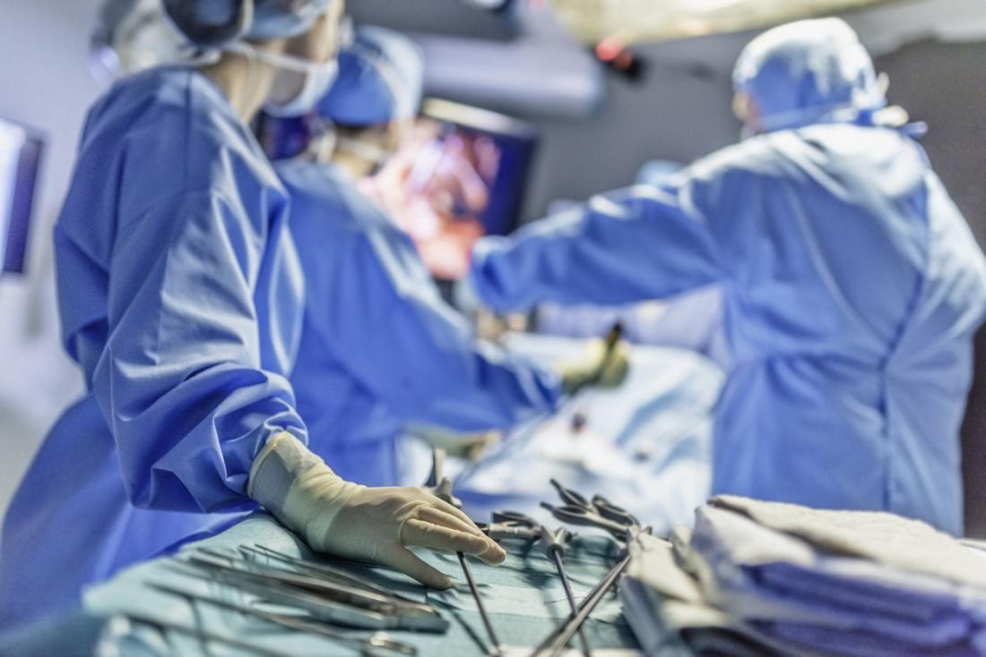 Surgeons performing surgery.