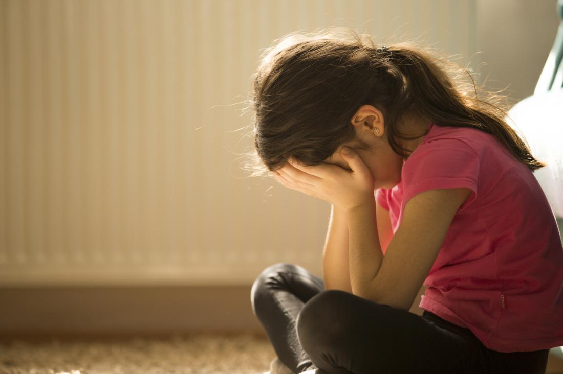 Upset and depressed child .