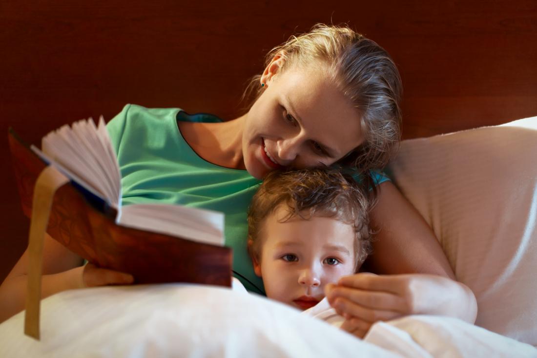 mother reading to her child at bedtime