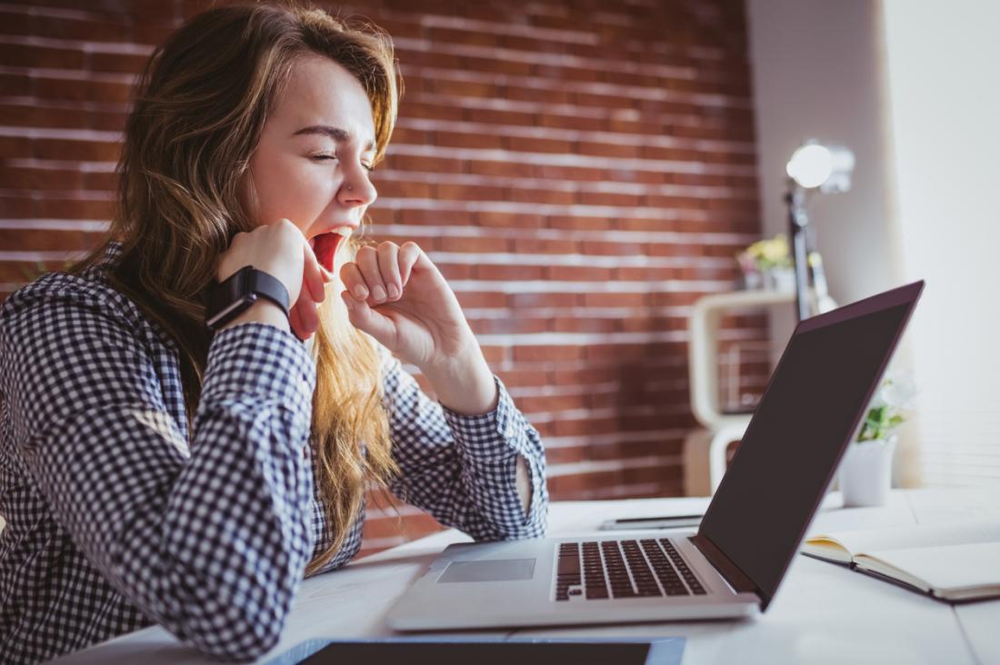 working woman yawning