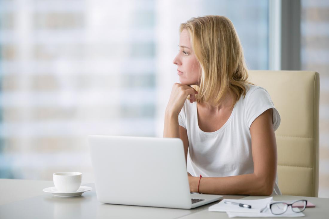 lady at work daydreaming