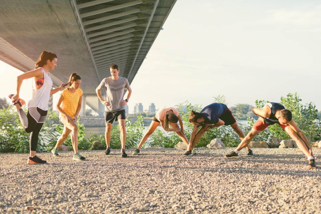 Group of runners warming up