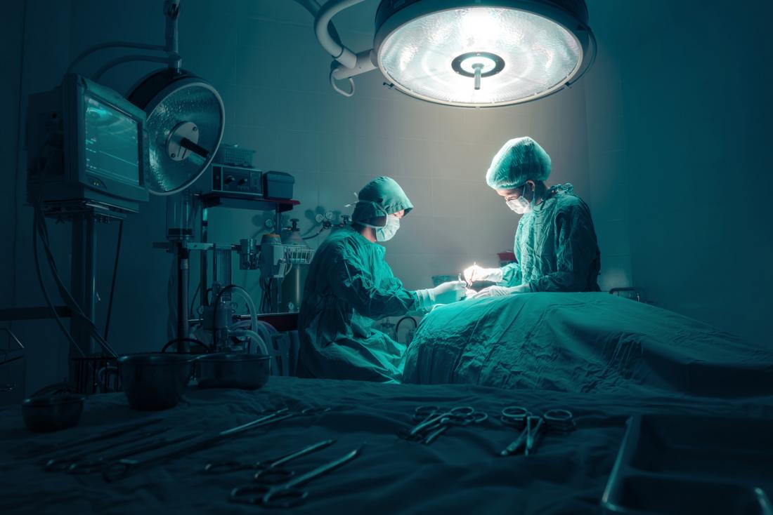 surgeons at work in surgery