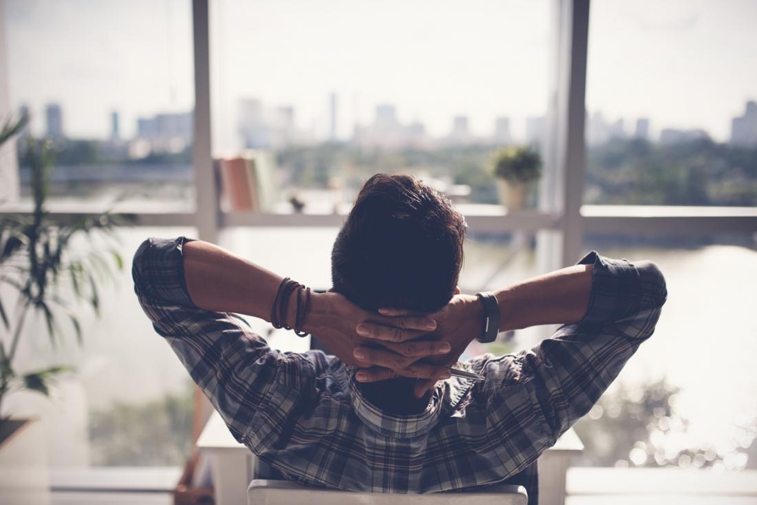 Man relaxing and looking at a view