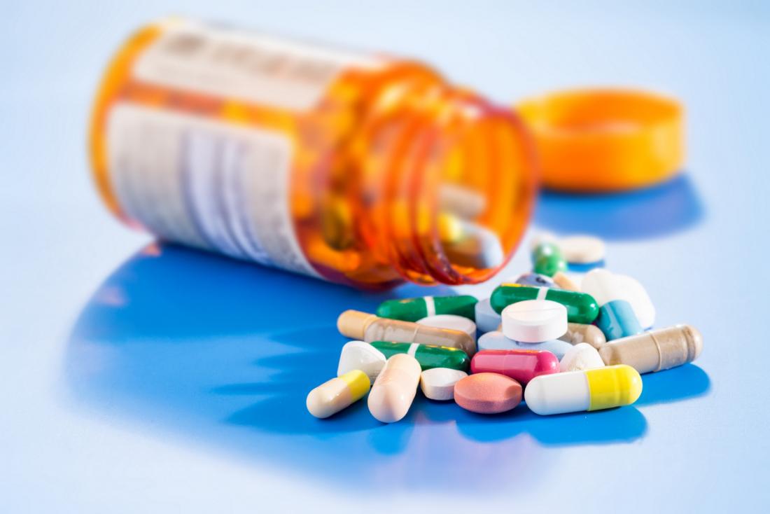 pills spilling out of a bottle