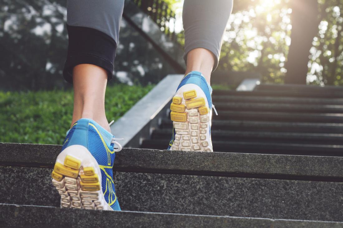 person running up some steps