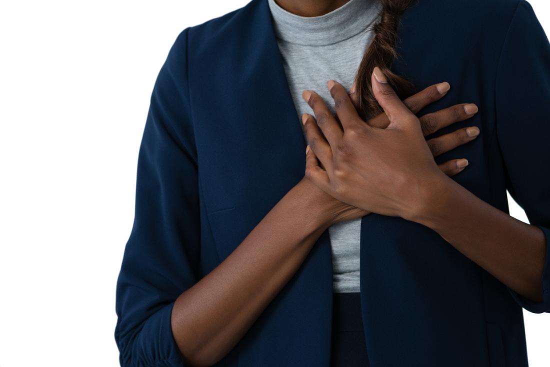 lady holding chest
